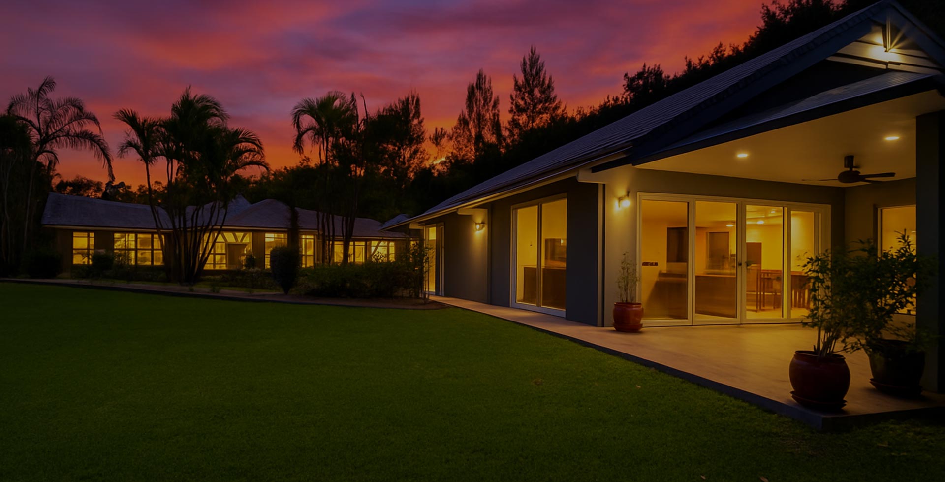 Whispering Pines estate at dusk